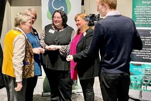 Helen Glass (SAOS) interviewing conference delegates