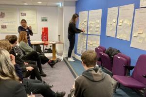 Students discussing climate-transition in the engineering sector during the workshop