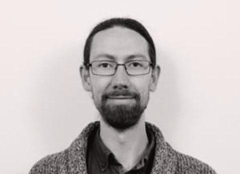headshot Damian Bienkowski